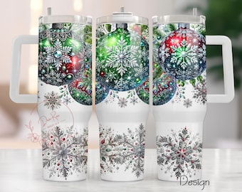 May include: White stainless steel tumbler with a handle. The tumbler features a Christmas design with red, green, and silver ornaments and snowflakes.