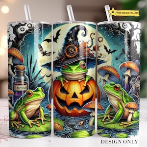 May include: A Halloween-themed tumbler featuring a green frog wearing a witch's hat and holding a jack-o'-lantern. The tumbler has a dark background with mushrooms and other spooky elements.