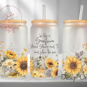 May include: Three frosted glass tumblers with bamboo lids and clear straws. Each tumbler features a sunflower design with the text "be like a sunflower stand strong and tall and follow the sun".