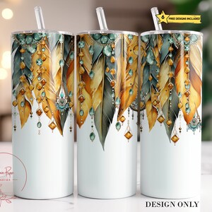 May include: A white tumbler with a design of gold and teal feathers and jewels. The tumbler is 20 ounces and has a straw.