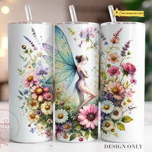 May include: A white tumbler with a design of a fairy with blue wings and flowers in shades of pink, purple, and yellow. The design is on a white background.