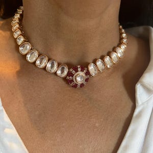 Scintillating Kundan Necklace with Earrings