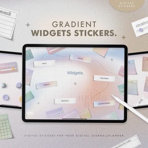 May include: A digital planner display with the words "Gradient Widgets Stickers." The image shows a tablet with digital stickers labelled "Daily," "Weekly," "Monthly," and "Trackers." A stylus is present, along with other digital elements.