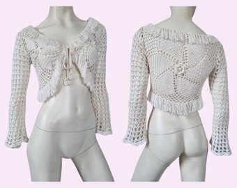 y2k crochet bolero shrug, 00s off white tie front crochet top, bell sleeve beaded shrug, floral crochet cardigan, fringe cardigan sweater