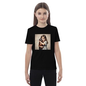 May include: A black youth t-shirt with a graphic of a girl hugging a large cockroach.