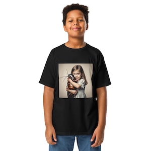 May include: A black t-shirt with a graphic of a young girl hugging a large cockroach. The girl is wearing a white dress and has long brown hair. The cockroach is brown and has long antennae.