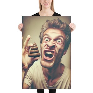May include: A poster featuring a man with a distorted, angry expression, holding a small, brown, stacked object. The man's eyes are wide, and his mouth is open in a scream. The poster is held by a person.