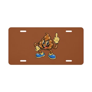 May include: Brown license plate featuring a cartoon poop character with a raised middle finger. The character has a smiling face, blue eyes, and is wearing blue shoes and yellow gloves. The background is a solid brown color.