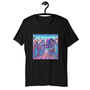 May include: Black t-shirt with a pixelated graphic of a giant spider attacking a city skyline. The spider is purple and pink, and the city is in a retro 80s style.