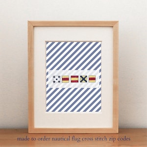 May include: A white ceramic mug with a black handle and the text "But First, Coffee" in a handwritten style. The mug is on a white surface. The mug is approximately 4 inches tall.