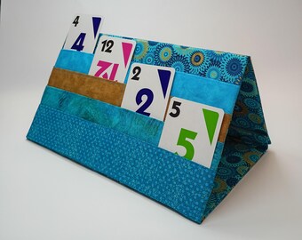 Card caddy, 4 level, multi-pocketed playing card holder. Collapsible flat fold for storage.