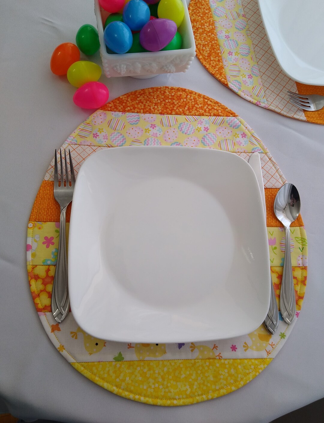 Quilted Easter Egg Placemat. Eggshaped Placemat in Stripes of Seasonal