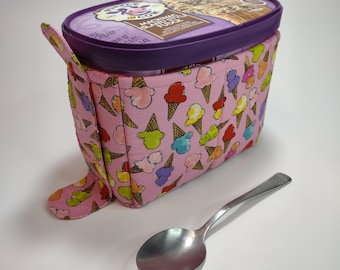 Quilted 1.5-quart size ice cream cozy. Rectangular half gallon holder with handle, easy in and out tabs. Insulate your hands from the cold.