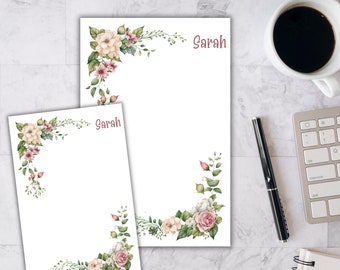 May include: Two printable stationery sheets with a floral design in shades of pink, white, and green. The sheets feature the name "Sarah" at the top. Design #1 is written at the bottom of the image.