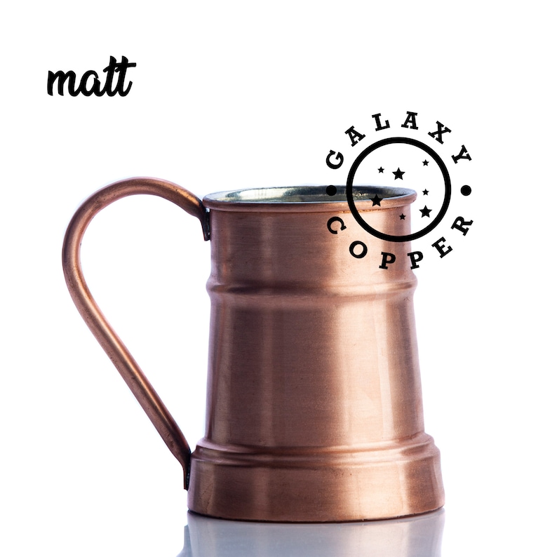 May include: A copper mug with a handle, featuring the text "GALAXY COPPER" in a circle with stars around it.