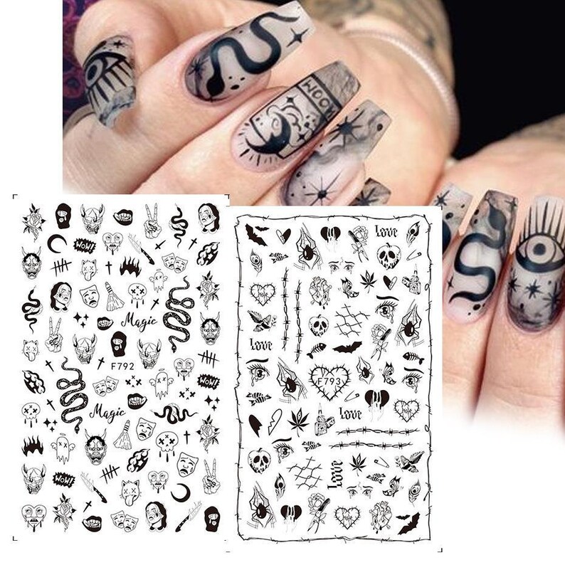 May include: Black and white nail art stickers with various designs, including skulls, snakes, hearts, eyes, and the words "Love", "Magic", and "F792".