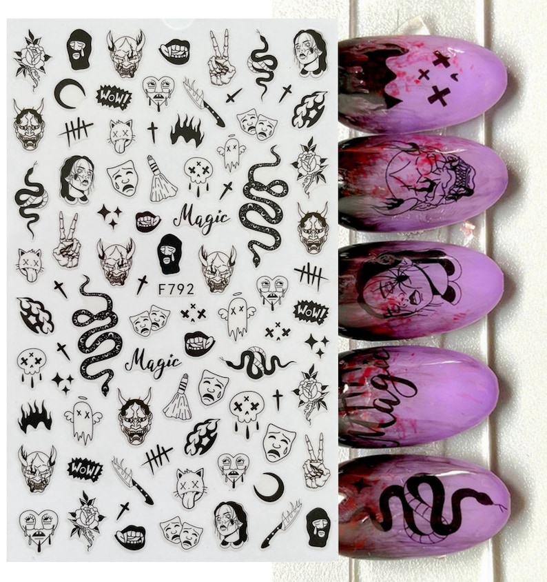 May include: A sheet of black and white nail art stickers featuring a range of designs, including skulls, snakes, demons, and crosses. The stickers are on a clear background and are ready to be applied to nails. The sheet also includes the text "Magic" and "F792".