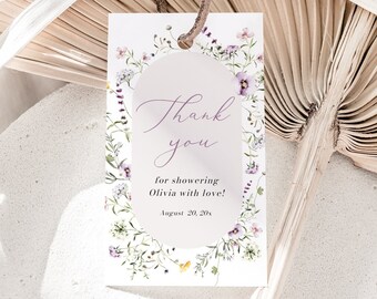 May include: A white thank you tag with a purple floral border and the text "Thank you for showering Olivia with love! August 20, 20x"