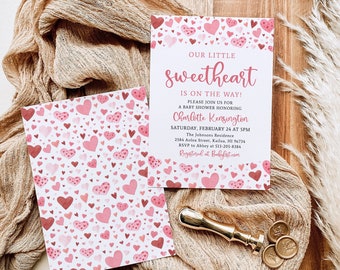 May include: Pink baby shower invitation with a heart pattern and the text "Our Little Sweetheart is on the way!"  Please join us for a baby shower honoring Charlotte Kensington. Saturday, February 24 at 5pm. The Johnsons Residence. 2584 Aoloa Street, Kailua, HI 96734. RSVP to Abbey at 513-205-8384. Register at Babylist.com