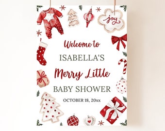 May include: A white baby shower sign with red and green watercolour illustrations of Christmas ornaments, candy canes, presents, and a gingerbread cookie that says "joy". The text on the sign reads "Welcome to Isabella's Merry Little Baby Shower October 18, 20xx".