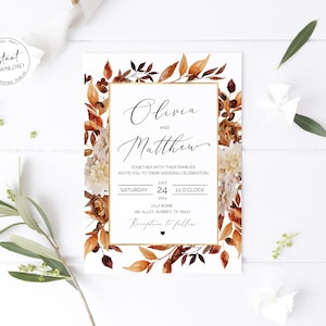 May include: Wedding invitation with a watercolor floral design in shades of brown, orange, and white. The invitation features the names "Olivia and Matthew" and details for their wedding celebration on July 24th at 1:00 PM. The text "Reception to follow" is also included.