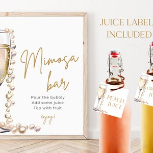 May include: A printable sign for a mimosa bar with a gold script font that says "Mimosa bar". The sign also includes instructions for making mimosas: "Pour the bubbly, Add some juice, Top with fruit, enjoy!" The sign is decorated with a watercolor illustration of a champagne flute with a pearl necklace draped around it. Two printable juice labels are also included, one for peach juice and one for orange juice.