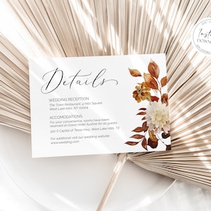 May include: A printable wedding details card with a watercolor floral design in shades of brown and white. The card includes information about the wedding reception at The Town Restaurant, 4 Hills Square, West Lake Hills, NY 10004, and accommodations at Grand Hotel Austine, 320 S Capital of Texas Hwy, West Lake Hills, TX. The card also includes a website address for additional information: www.wedding.com.