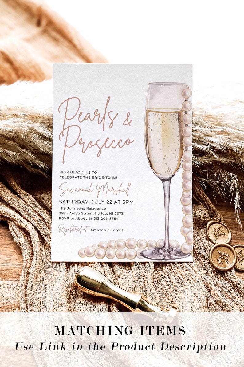 May include: A white invitation card with a watercolor illustration of a champagne flute and pearls. The text on the card reads "Pearls & Prosecco" and includes details for a bridal shower for Savannah Marshall.