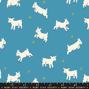 May include: A blue fabric with a white repeating pattern of goats. The goats are in various poses, some are jumping, some are standing, and some are walking. The fabric has a subtle texture.