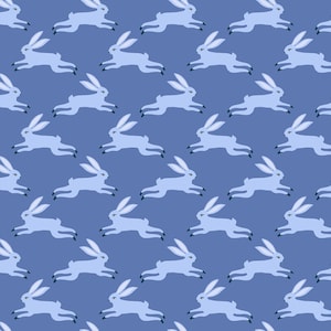 May include: A seamless pattern featuring a repeating design of light blue rabbits hopping on a blue background.