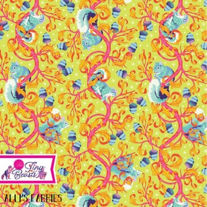 May include: A whimsical fabric design featuring a repeating pattern of blue squirrels perched on pink branches with yellow leaves. The background is a bright yellow with white stars and blue and white acorns. The text "Tiny Beasts" and "Alli's Fabbies" is included in the design.