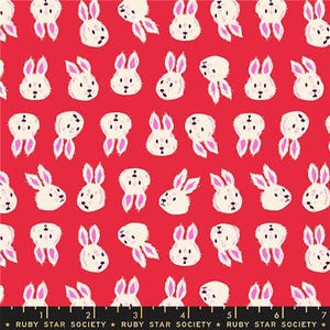 May include: Red fabric with a repeating pattern of white bunnies with pink ears and noses. The bunnies are in various orientations. The text "RUBY STAR SOCIETY" is at the bottom.