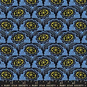 May include: A repeating pattern of stylized flowers in black, yellow, and light blue. The flowers have a central yellow circle with a star-like design, surrounded by black petals. The background is light blue with small black dots. The text "RUBY STAR SOCIETY" is at the bottom.