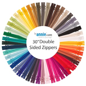 May include: A variety of 30-inch double-sided zippers in a rainbow of colors, arranged in a circle. The text "by annie.com ... what's in your bag? 30" Double Sided Zippers" is in the center of the circle.
