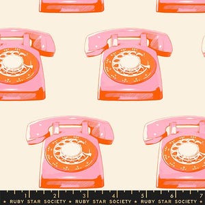 May include: A repeating pattern of pink and orange retro rotary phones on a cream background. The phones have a circular dial and a handset. The design is reminiscent of vintage aesthetics.