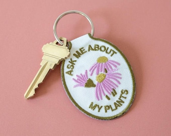 Ask me about my plants embroidered keychain | Car key accessory embroidery gift ideas, summer, pink, green thumb, purple