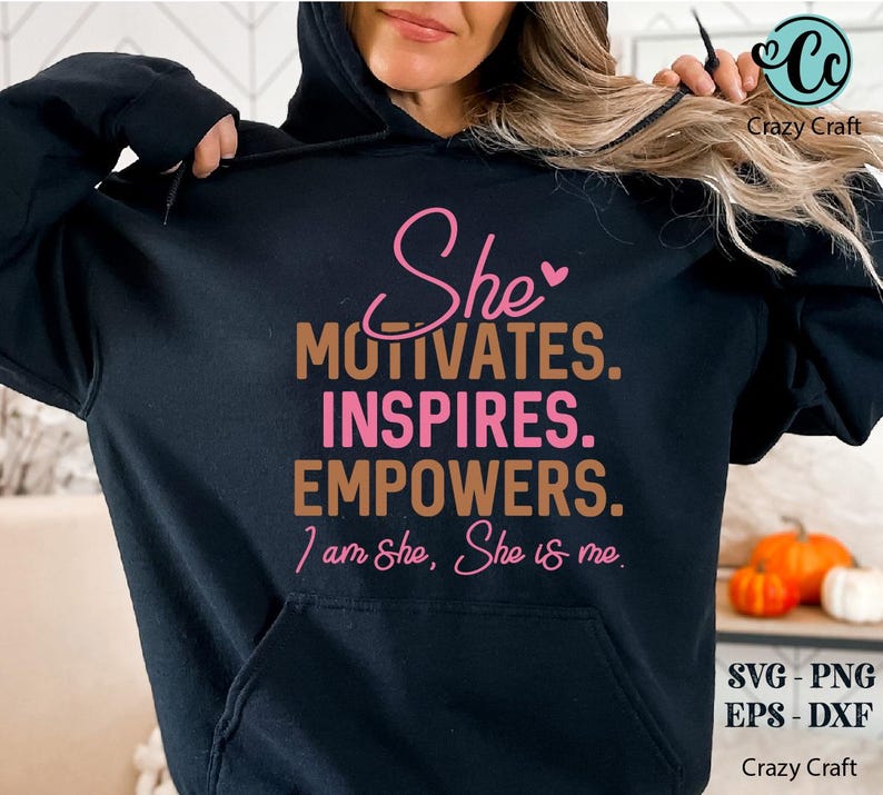 May include: Black hoodie with the text "She motivates. Inspires. Empowers. I am She, She is me." in pink and brown lettering.