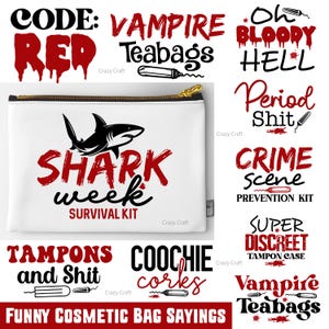 May include: A white cosmetic bag with a gold zip, displaying a black shark design and the text "SHARK week SURVIVAL KIT" in red and black. Other phrases include "Vampire Teabags" and "Funny Cosmetic Bag Sayings".