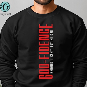 May include: Black sweatshirt with red text that reads "GOOD-FIDENECE KNOWING I CAN'T BUT HE CAN"