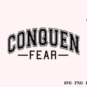 May include: Black and white graphic design with the words "CONQUER FEAR" in a bold, arched font. Below the text is the word "FEAR" underlined. The Crazy Craft logo is in the upper right corner.