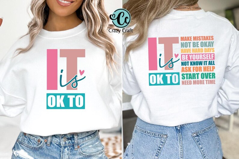 May include: White sweatshirt with the text "It is OK to" on the front and a list of phrases on the back, including "Make Mistakes", "Not Be Okay", "Have Hard Days", "Be Yourself", "Not Know It All", "Ask For Help", "Start Over", and "Need More Time".