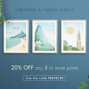 May include: Three framed travel posters with a 20% off sale for orders of 3 or more prints. The posters feature illustrations of Rio de Janeiro, Peru, and New York City. The text "CREATING A TRAVEL WALL?" is at the top of the image. The text "20% OFF any 3 or more prints" is in the center of the image. The text "Use the code TRAVEL20" is at the bottom of the image.