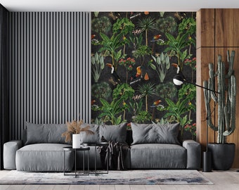 May include: A dark gray couch with black cushions sits in front of a wall with a tropical wallpaper featuring toucans, palm trees, and other foliage. The wallpaper is a dark green and black color scheme.