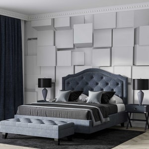May include: A modern bedroom featuring a tufted blue bed with matching bench and nightstands. The room has a geometric wall design, dark blue curtains, and black lamps. The bed is made with gray and black bedding.