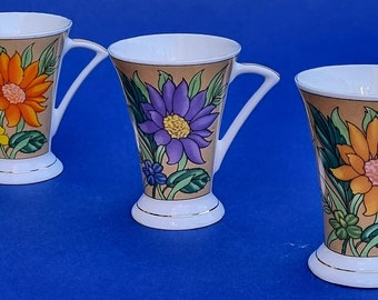 3 Vintage Art Deco Style Floral Bone China Mugs with Gilded Rims Base. Sold Individually.