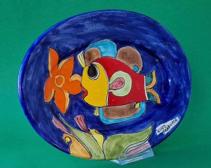 Featured listing image: Nino Parrucca Pottery, Italy, Colourful Vintage 1990s Glazed Hand Painted Fish Pattern Oval Wall Plate. Decorative and Collectible.