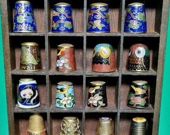 A Wonderful Vintage Wooden Thimbles Display Case & A Selection of 24 Various Thimbles, With The Earliest Dating Back From the 1920s.