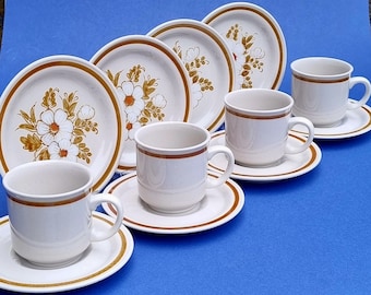 A Retro 1970s Set of 4 Mountain Wood "Dried Flowers" Patterned Stoneware Trio of Cup, Saucer & Side Plate. Made in Japan.