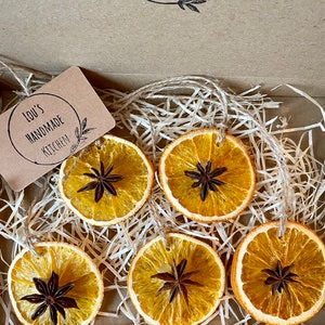 Rustic dried fruit Christmas decoration. Dried orange, festive plastic free decoration.