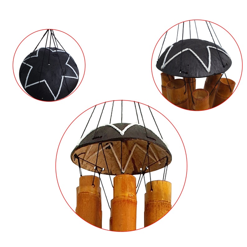 May include: A black and white wind chime with a star-shaped top and five bamboo tubes. The wind chime is hanging from a string.